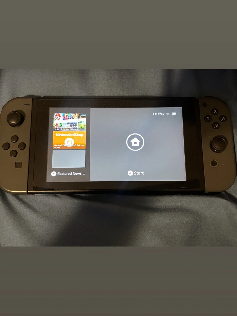 Nintendo Switch Console with Dark Gray Joy‑Con and Black Dock
